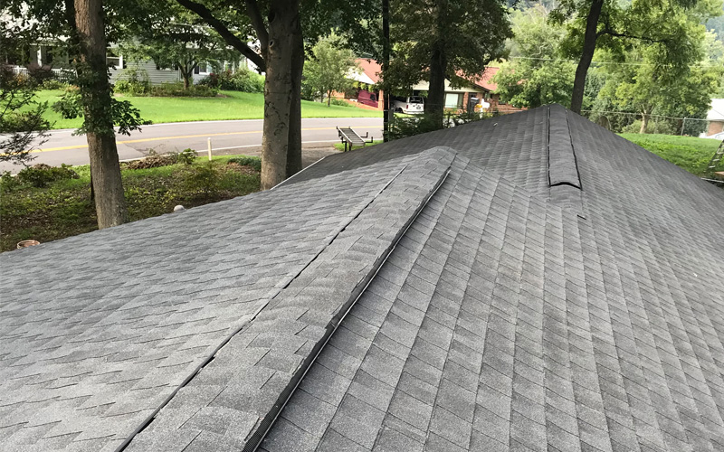 Photo of newly installed asphalt shingle roofing system